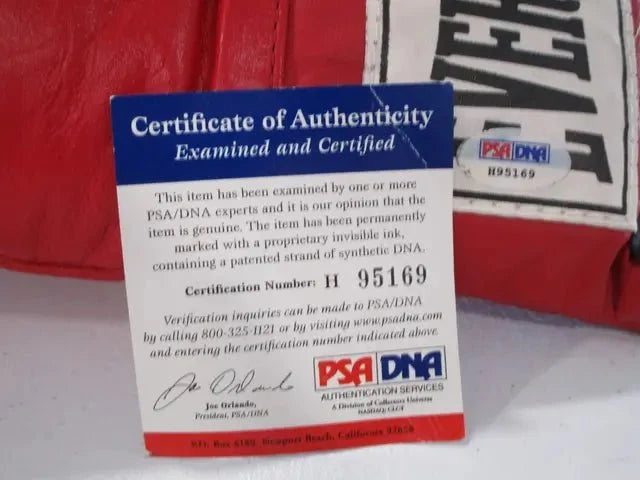 Montell Griffin Signed Boxing Glove (PSA DNA COA)