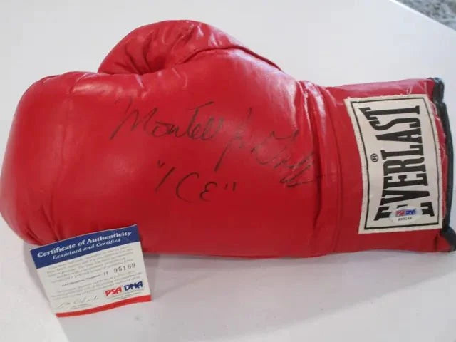 Montell Griffin Signed Boxing Glove (PSA DNA COA)